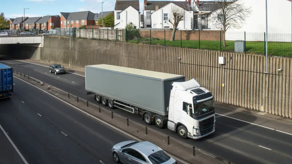 HGV on UK motorway representing the transport and logistics industry UK